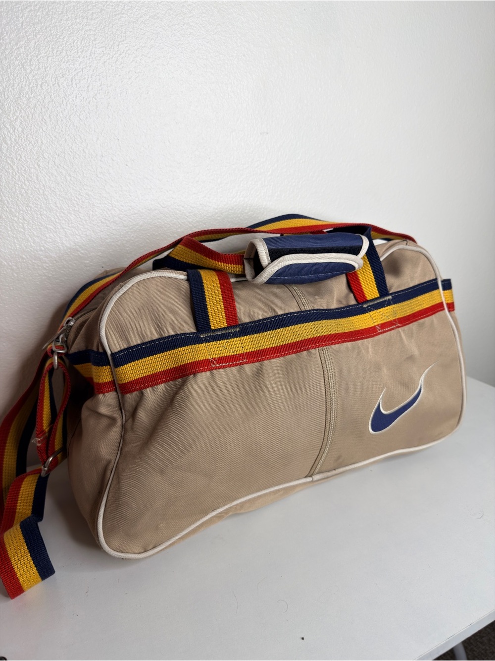 Nike Khaki Duffel Bag with Red-Yellow-Blue Webbing Strap Vintage